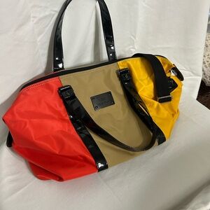 SM New York Red, Yellow, and Tan Travel Bag